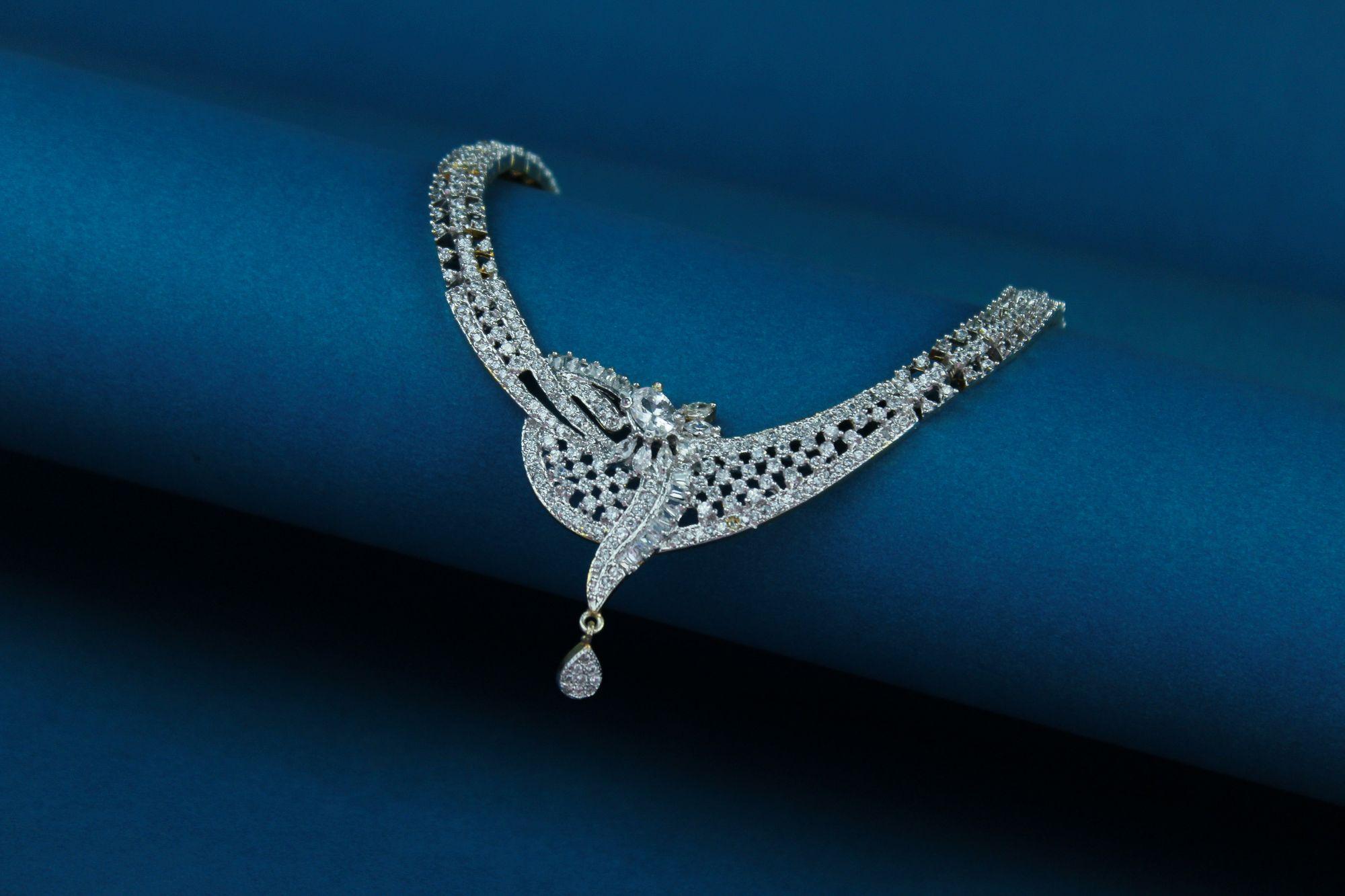 The Rivière Sapphire necklace on midnight silk